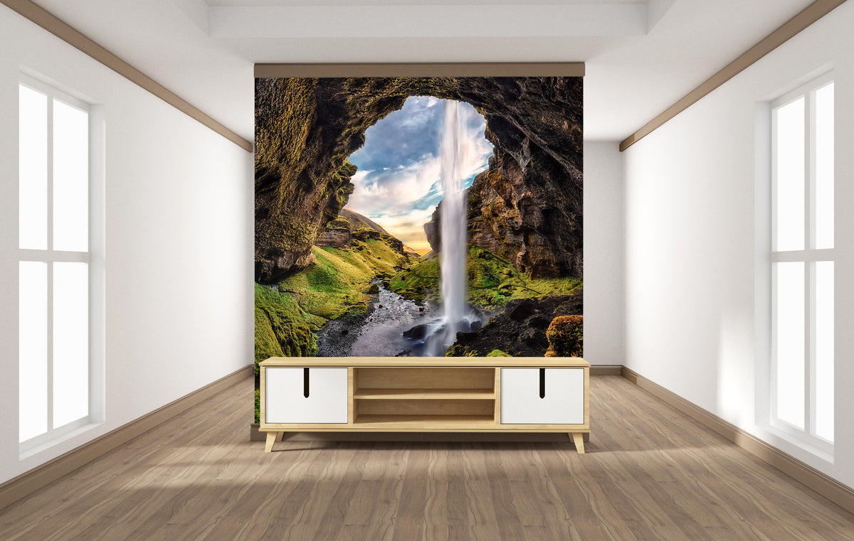 A wall mural featuring a natural landscape with a waterfall, displayed in a living room setting.